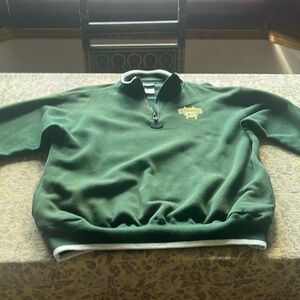 Green Bay Packers Pullover with a 1/4 length zipper. Machine washable.